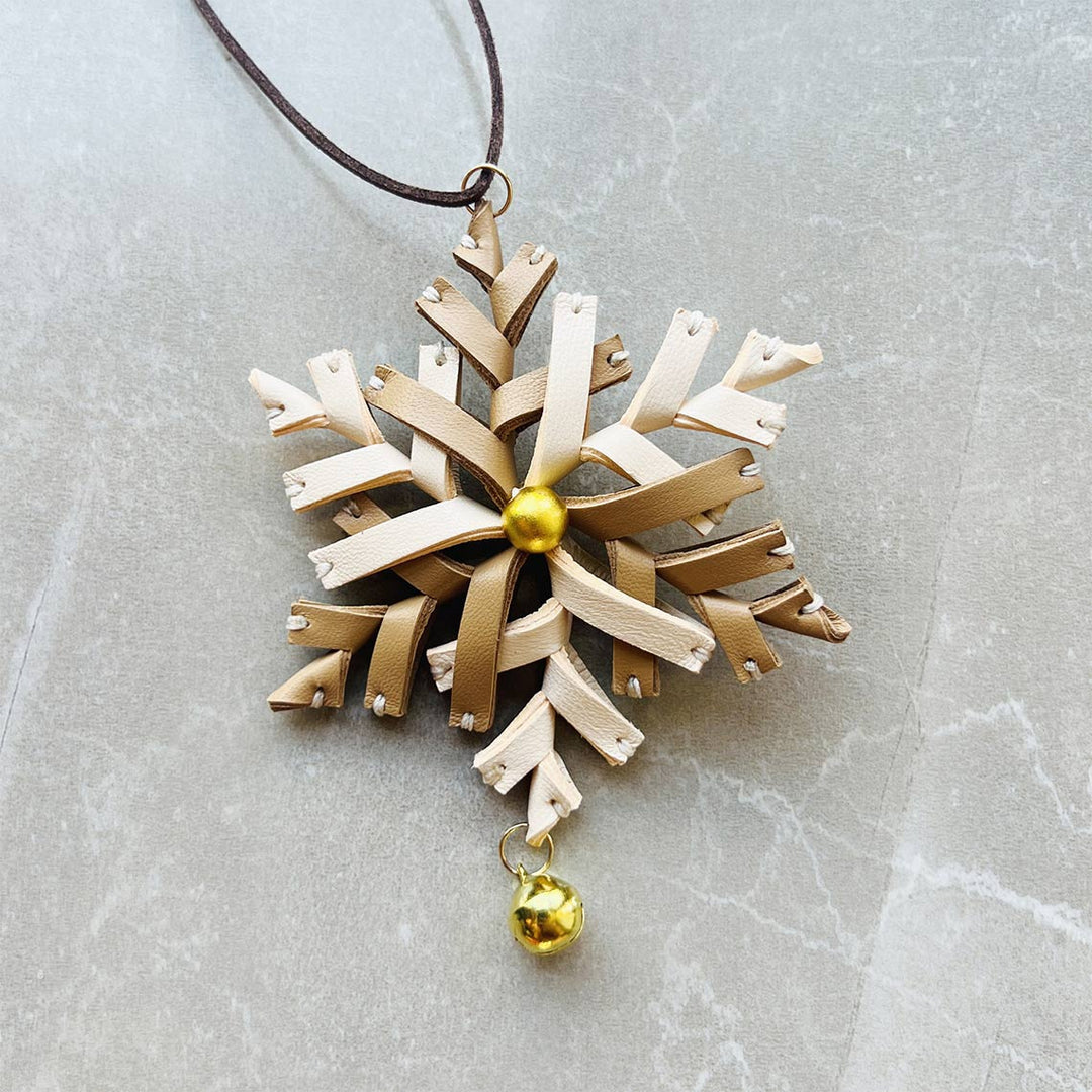 Genuine leather purse charm in snowflake design